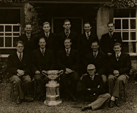 TRC crew in the Grand Challenge Cup 1948 posing with trophy