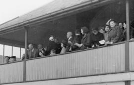 Princess Elizabeth and others watch the Head of the River Race from the TRC balcony